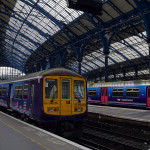 A First Capital Connect train in Brighton Station. By Vera Blossom from Flickr