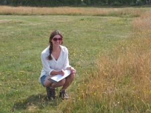 Researcher Katie Fensome by the long grass