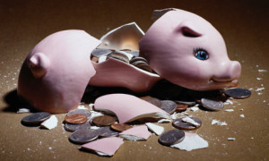 broken piggy bank for debt stories