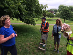 Thanks a bunch: Sally Gunnell, with flowers, watches runners complete the 5k around Hove Park
