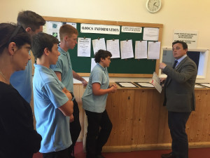 Patcham High School pupils in the weighing room at Brighton Racecourse with the Clerk of the Scales Leigh O’Brien