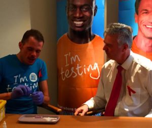 Tom Boyt, from the Terrence Higgins Trust, tests Simon Kirby during National HIV Testing Week last year