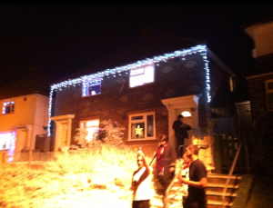 The film crew outside Carlie's house during filming