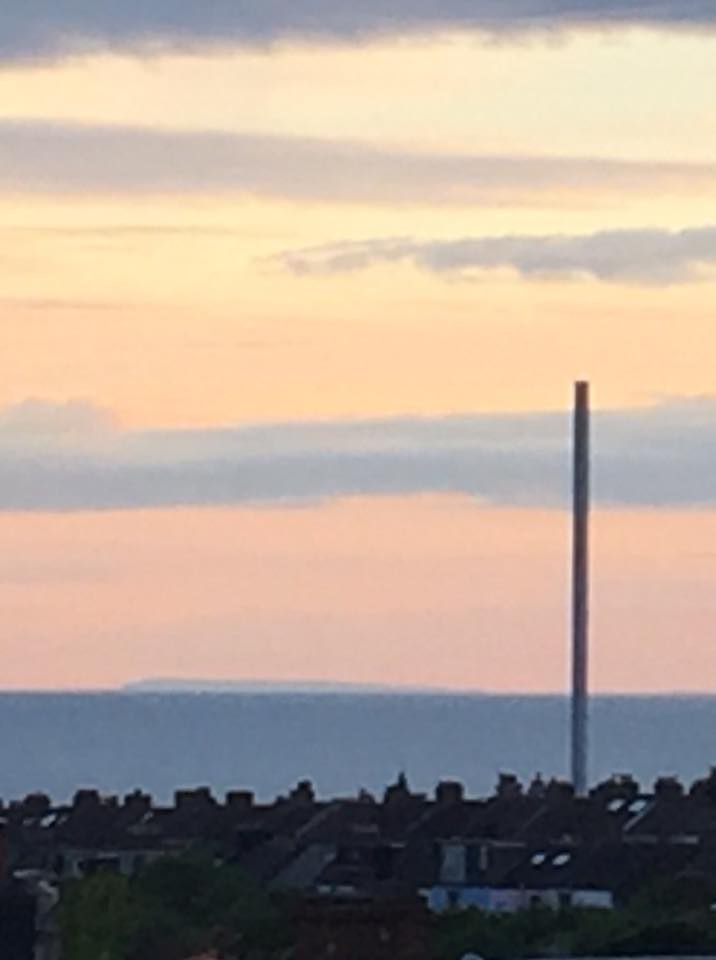 Clear air gives clear view of Isle of Wight from Brighton hill
