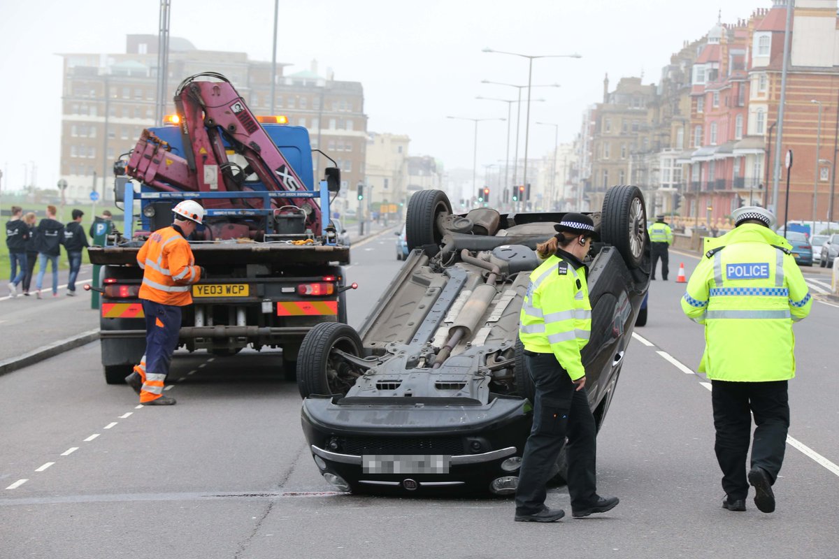 Car flips over on Hove seafront
