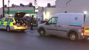 Police and paramedics at the scene of the stabbing outside the Co-op on the corner of Abinger Road and Shelldale Road in Portslade