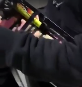 A firework strapped to a skateboard