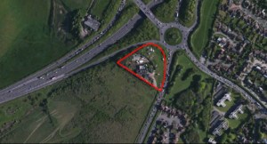 An aerial view with the Court Farm House site bordered in red