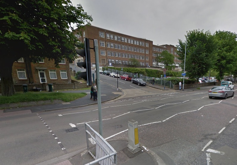 Brighton bus driver freed unhurt after crash with car