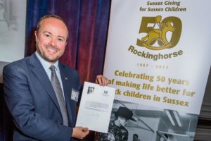 Rockinghorse chief executive Ryan Heal with the letter from Prime Minister Theresa May