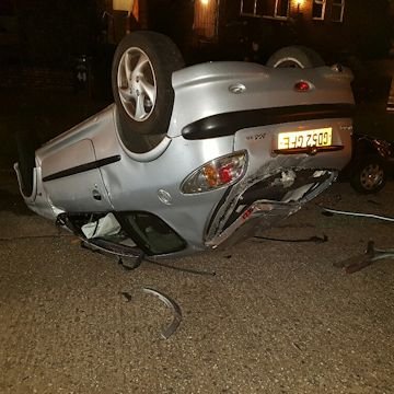 Drunk woman flips car with young son in back