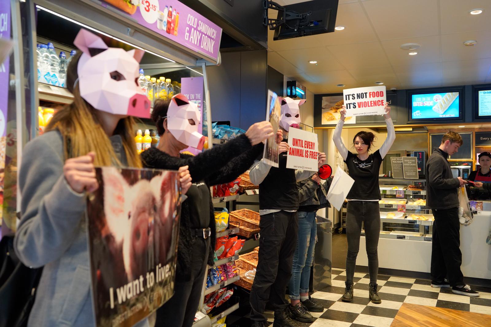 Vegan activists don pig masks for Greggs protest