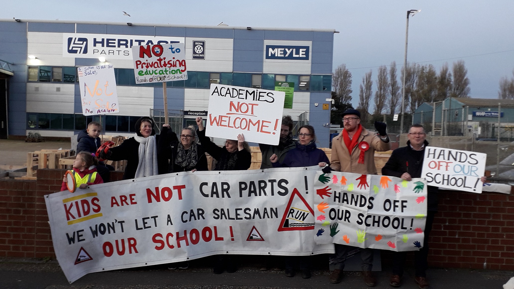 Parents protest outside academy trustee's workplace - Brighton and Hove News