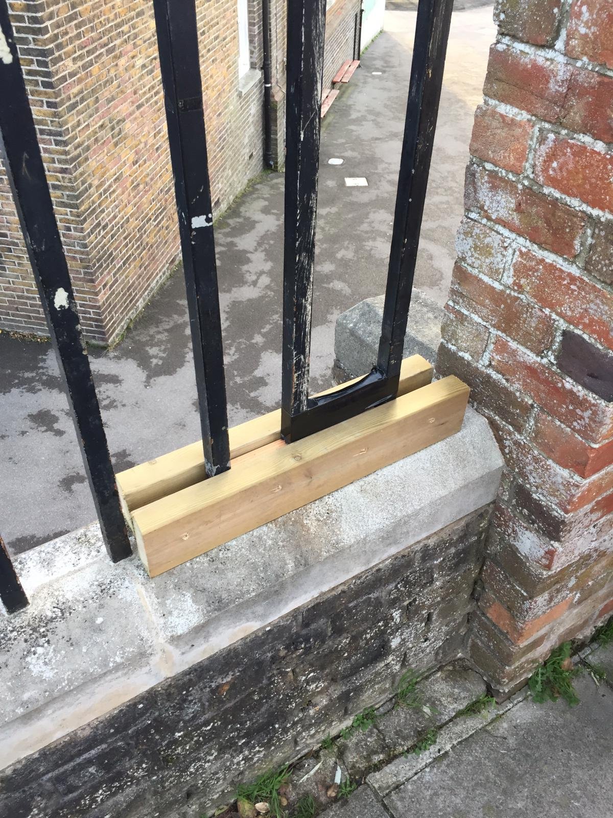 Boy rescued after getting head stuck in railings