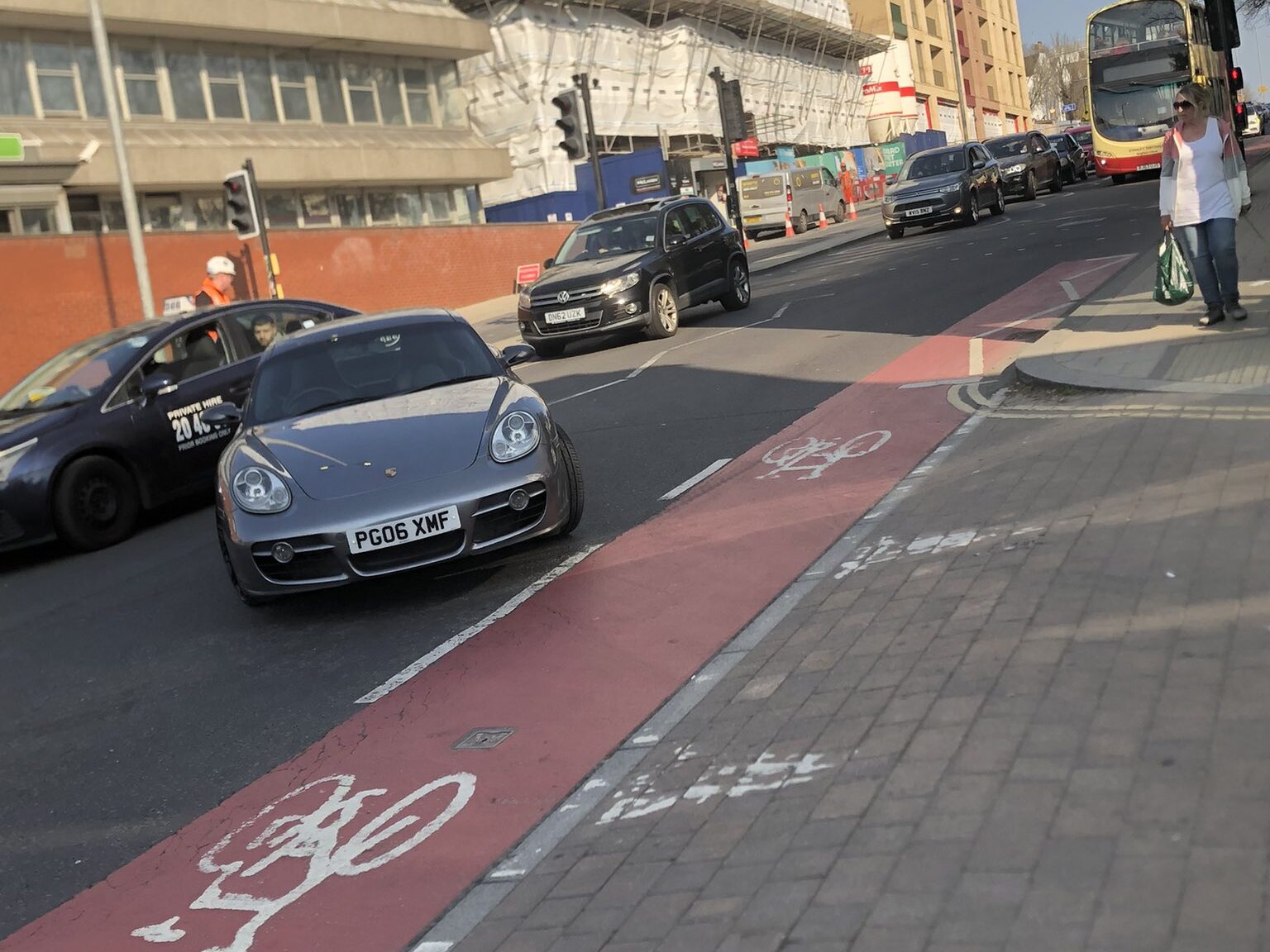 Porsche driver abandons car in busy road