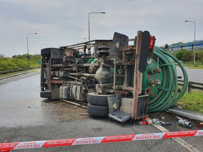Overturned sewage lorry on A23 stems flow of traffic