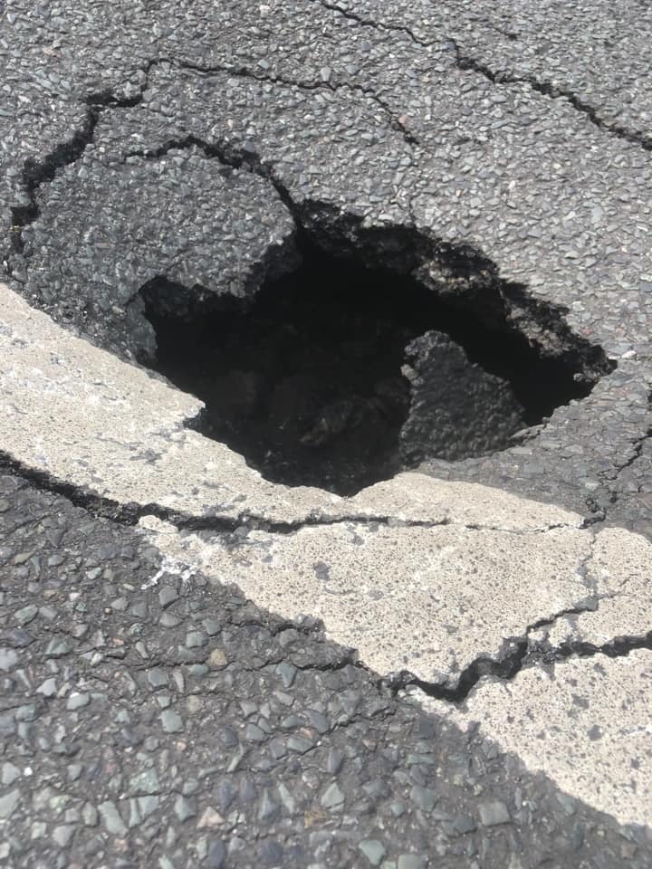 Sink hole opens up in Brighton road