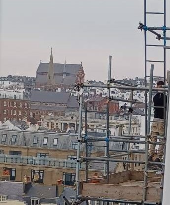 Police persuade man to come down from Brighton scaffold