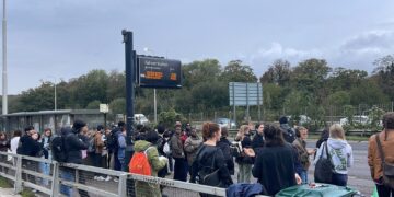 Crowds at Falmer bus stop outside university