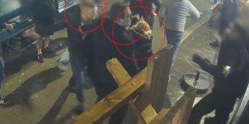 Moment football thug lands punch which sent him to prison caught on camera