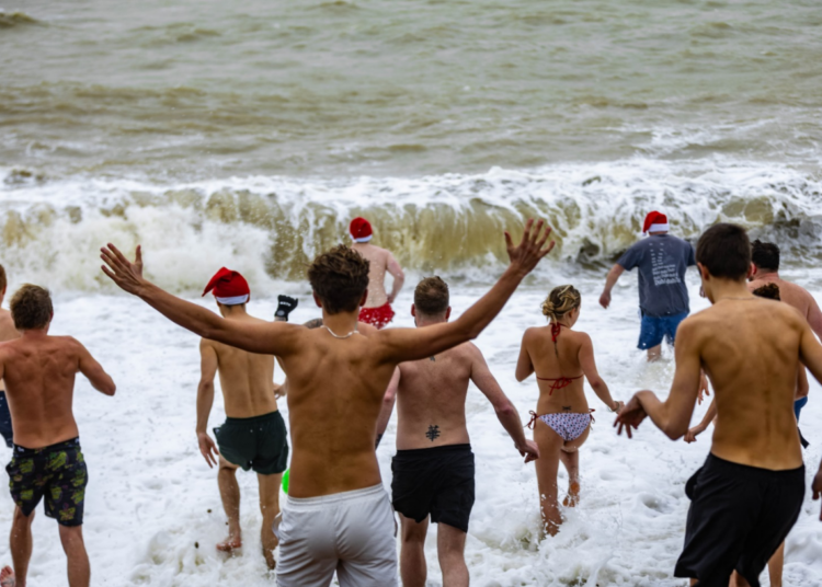 Hundreds turn out for Christmas Day swim in the sea