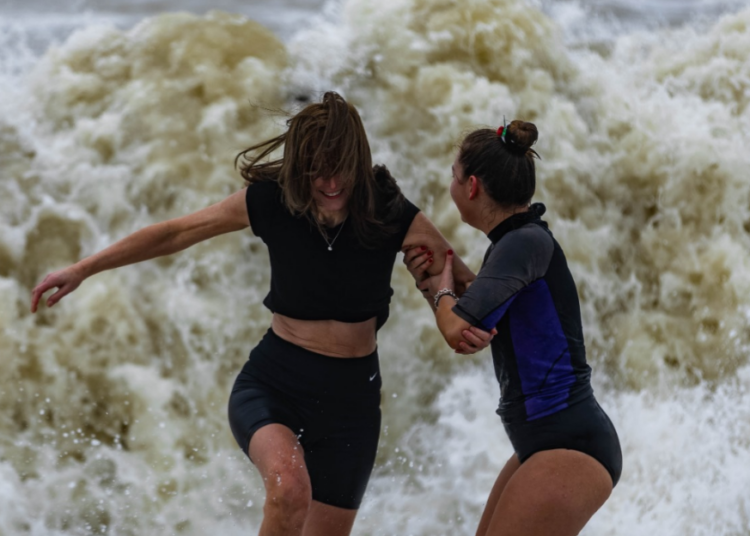 Hundreds turn out for Christmas Day swim in the sea