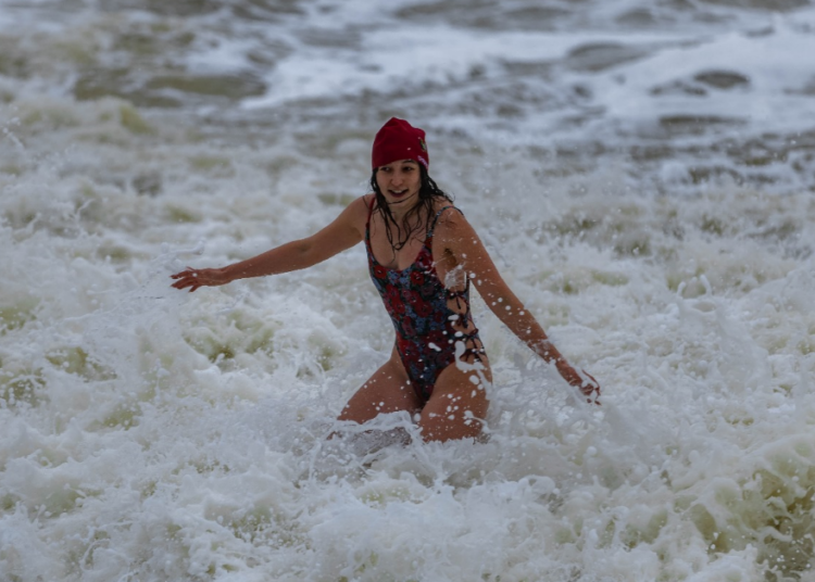 Hundreds turn out for Christmas Day swim in the sea