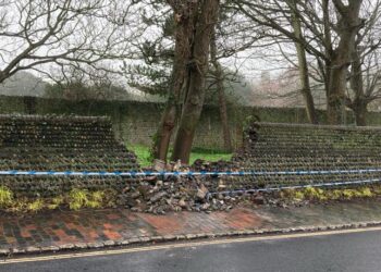 Driver crashes into wall during police chase