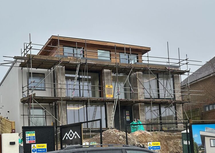 Couple told to stop work on new house until council bill is paid