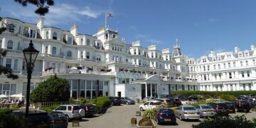 Detective found in hotel room with half-naked colleague denies misconduct