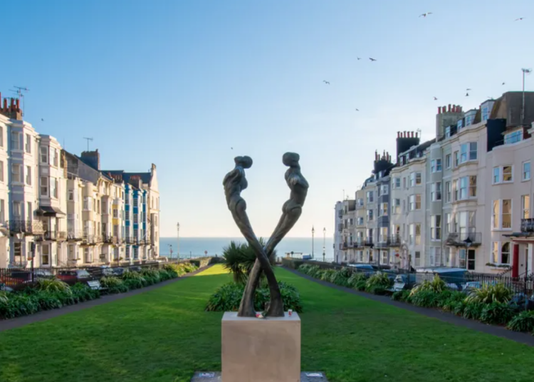 Three people arrested after woman found dead in Brighton hotel today