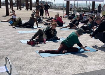 Ed Sheeran does a spot of yoga on Brighton beach – or does he?
