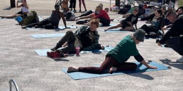 Ed Sheeran does a spot of yoga on Brighton beach – or does he?