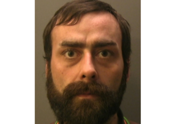 Knife-wielding post office robber jailed for 12 years