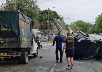 Mum and son have lucky escape after car flips in pothole crash