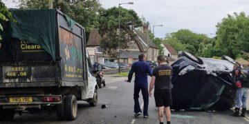 Mum and son have lucky escape after car flips in pothole crash
