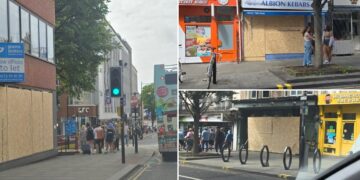 City centre businesses board up amid race riot reports