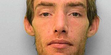 Burglar broke foot trying to escape over fence