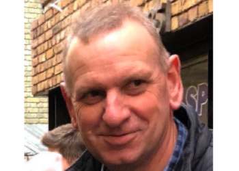 Former teacher honoured by King