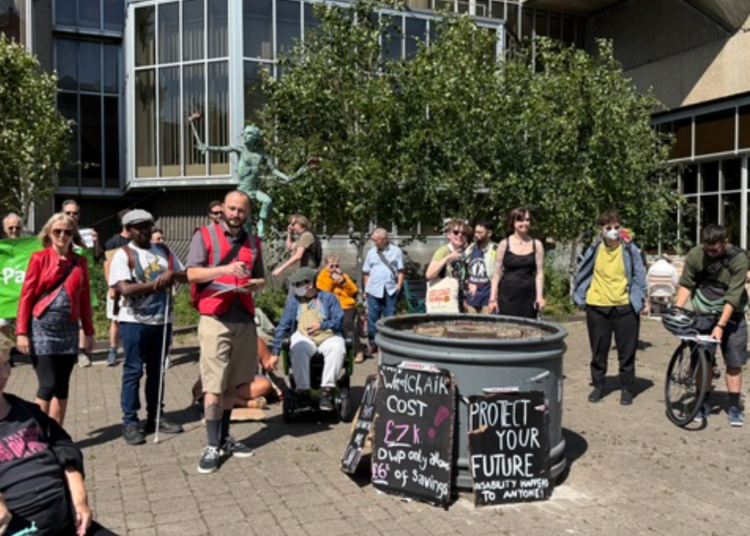 Disability campaigners protest before special council meeting discusses welfare reforms