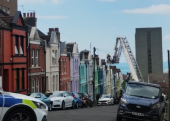 Firefighters rescue man from roof