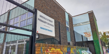 Sinkhole appears outside financially troubled Brighton school