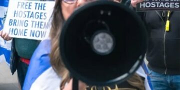 Protester damaged megaphone in self-defence, court finds