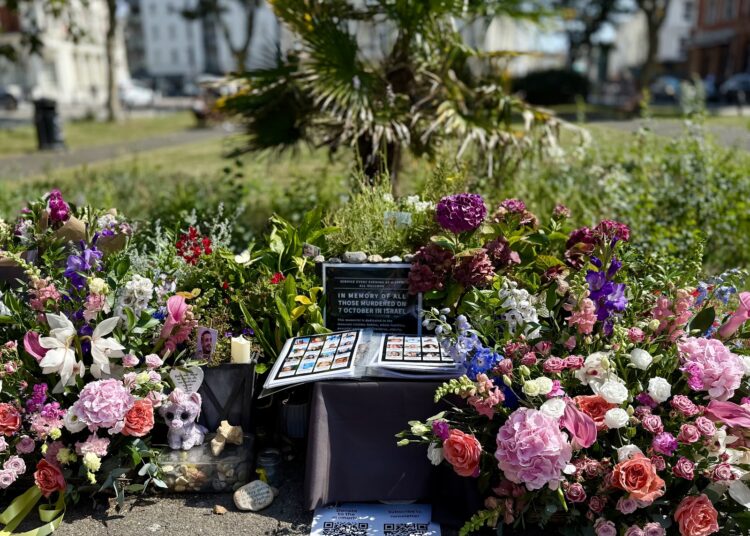 Woman denies damaging Israeli memorial