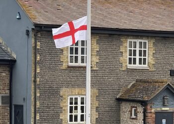 St George’s flags stay for now as contractors removing them report abuse