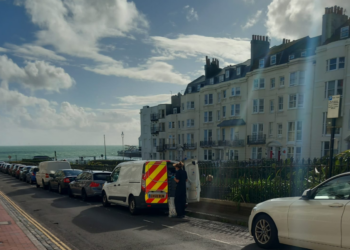 Woman in hospital after being found unconscious in Brighton hotel