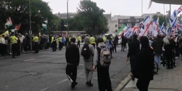 Protester ordered to pay compensation over broken phone