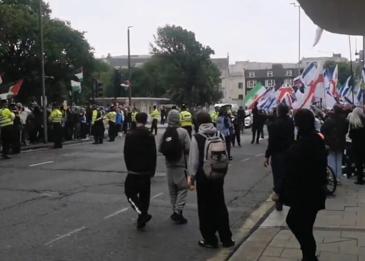 Protester ordered to pay compensation over broken phone