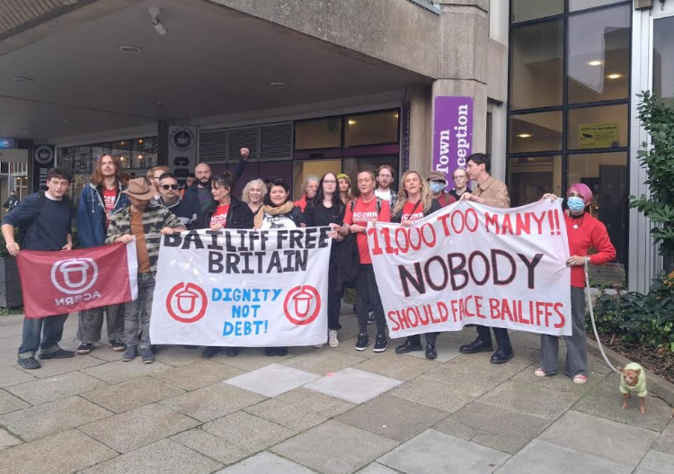 Protesters halt council cabinet meeting at town hall