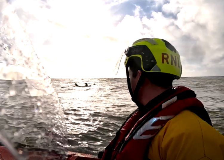 Lifeboat rescues four people in swamped boat